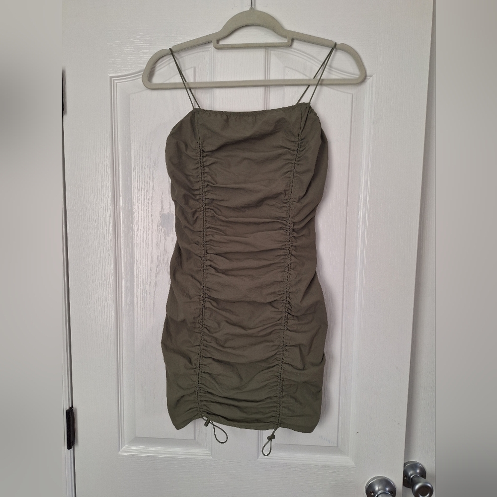 Honey Peach olive green ruched bodycon mini dress featuring spaghetti straps
